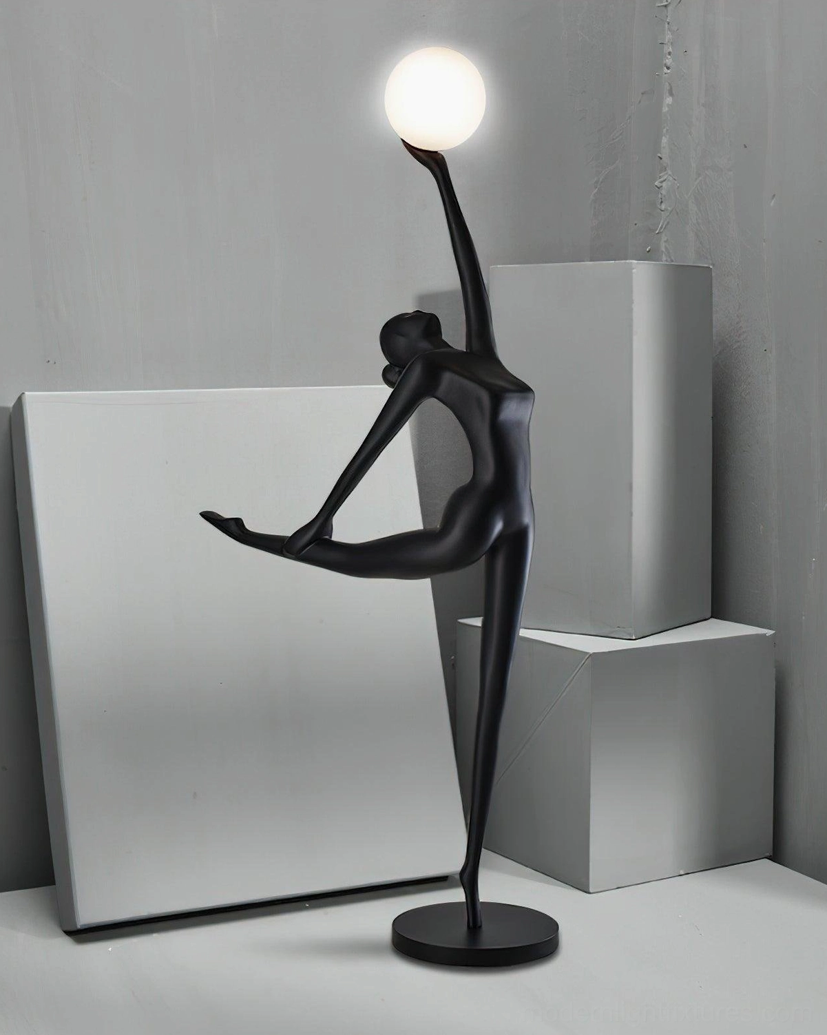 Artistic ballerina floor lamp with dancing figure silhouette and modern globe light fixture