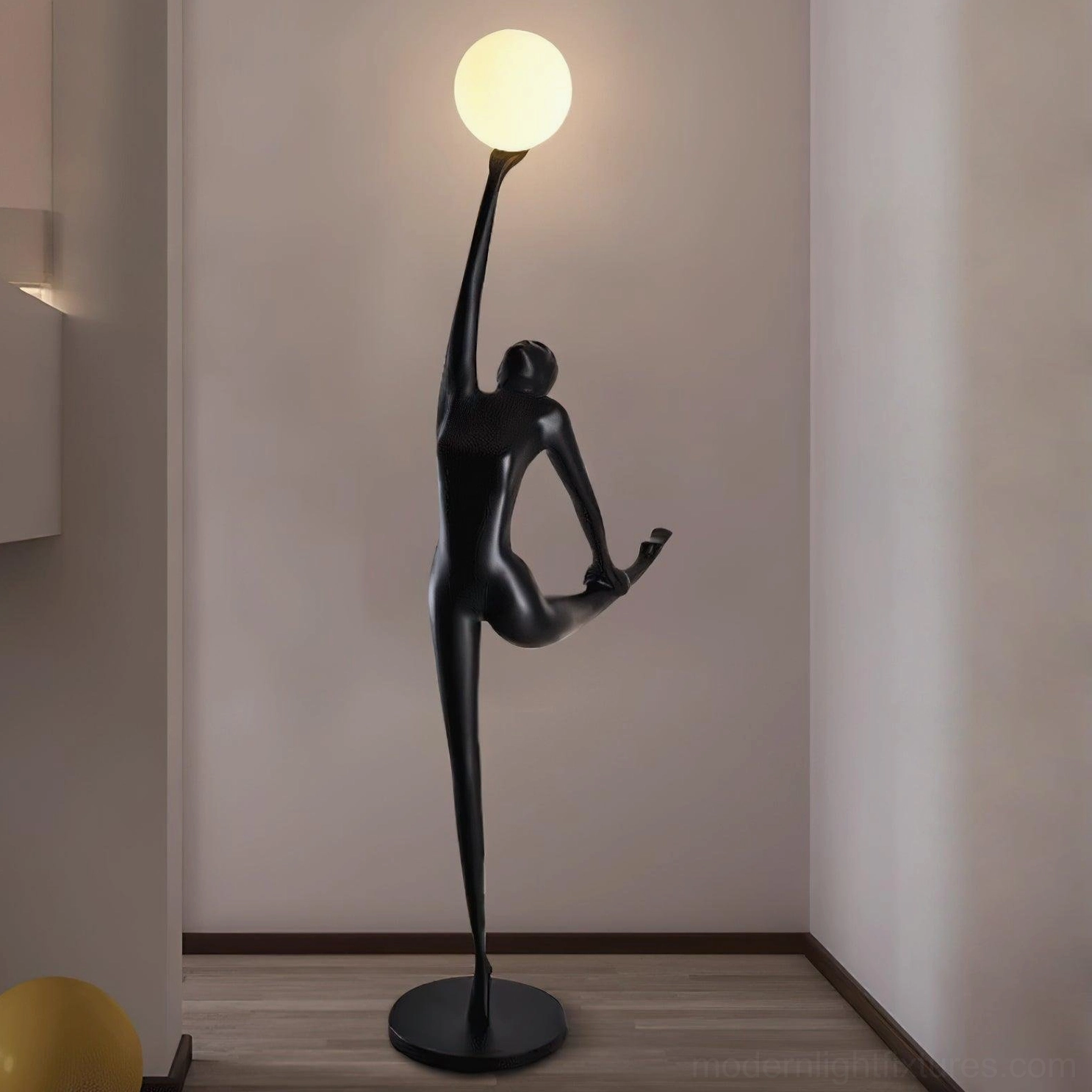 Modern ballerina floor lamp with premium resin body and spherical glass lamp shade in black and white