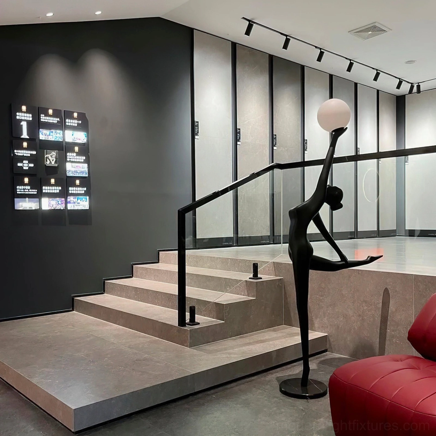 Modern sculptural ballerina arabesque floor lamp creating dramatic shadows and artistic lighting