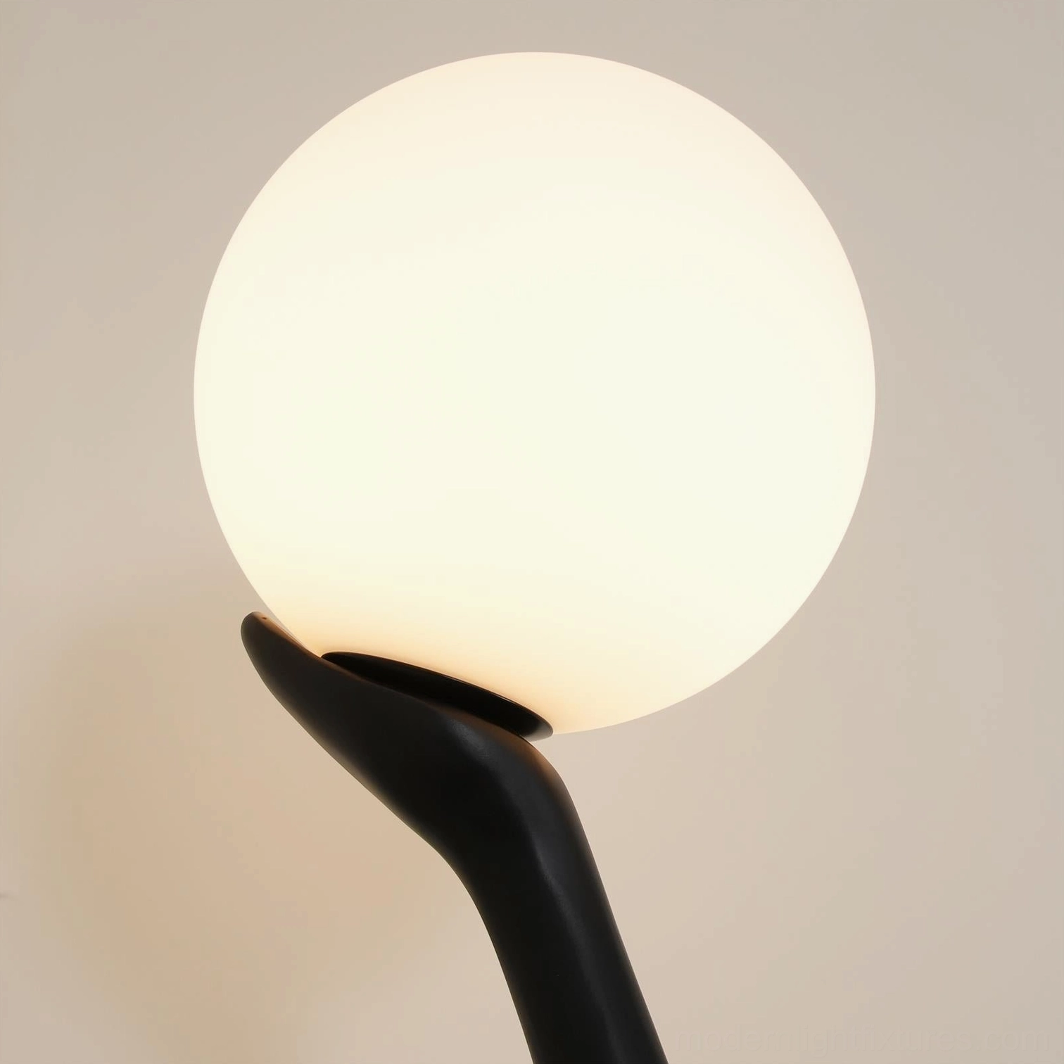 Premium ballerina floor lamp with sleek matte black finish and opal white sphere on concrete floor