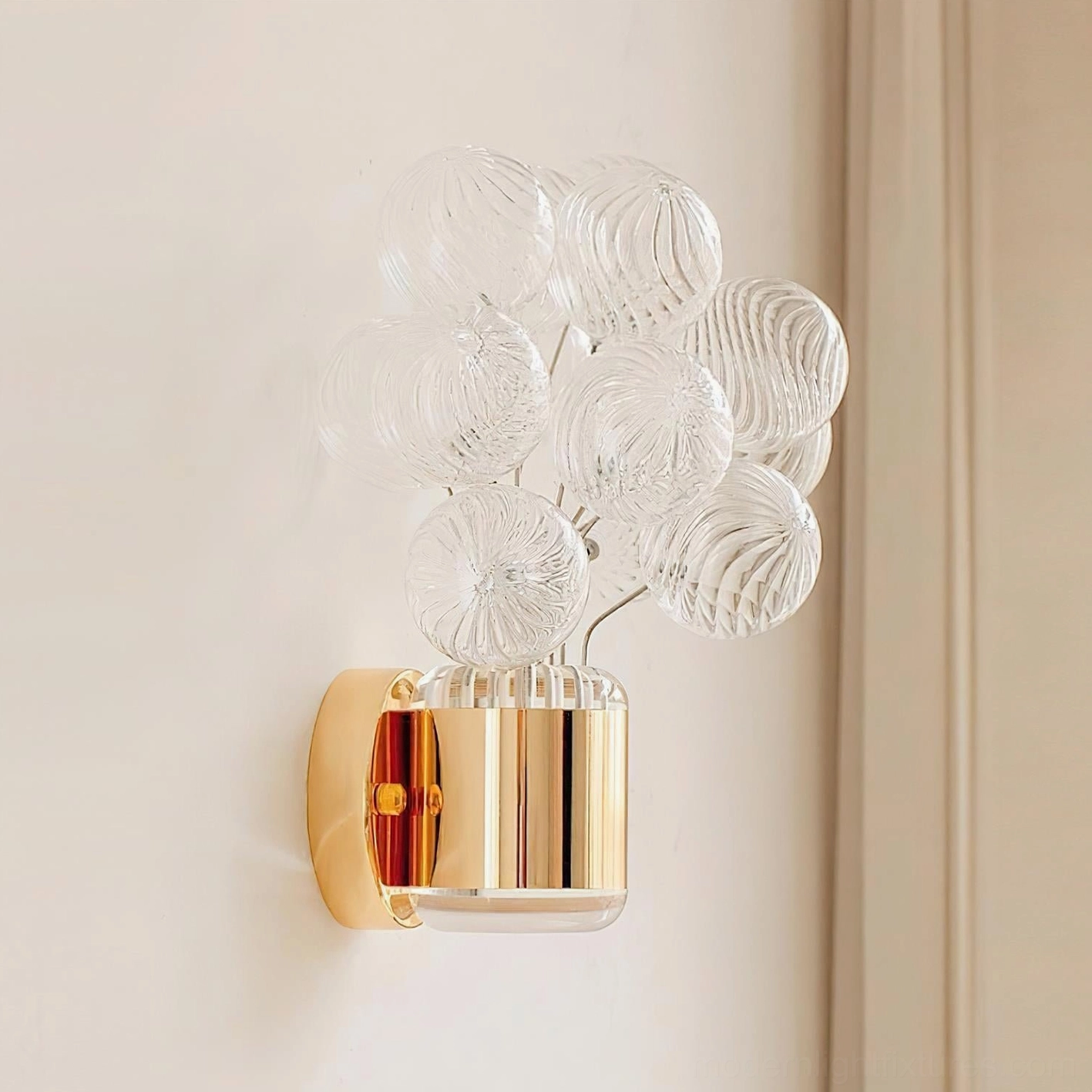 Gold and Clear Balloon Bouquet Wall Sconce with smooth transparent glass balloons and polished metal wall mount in front view