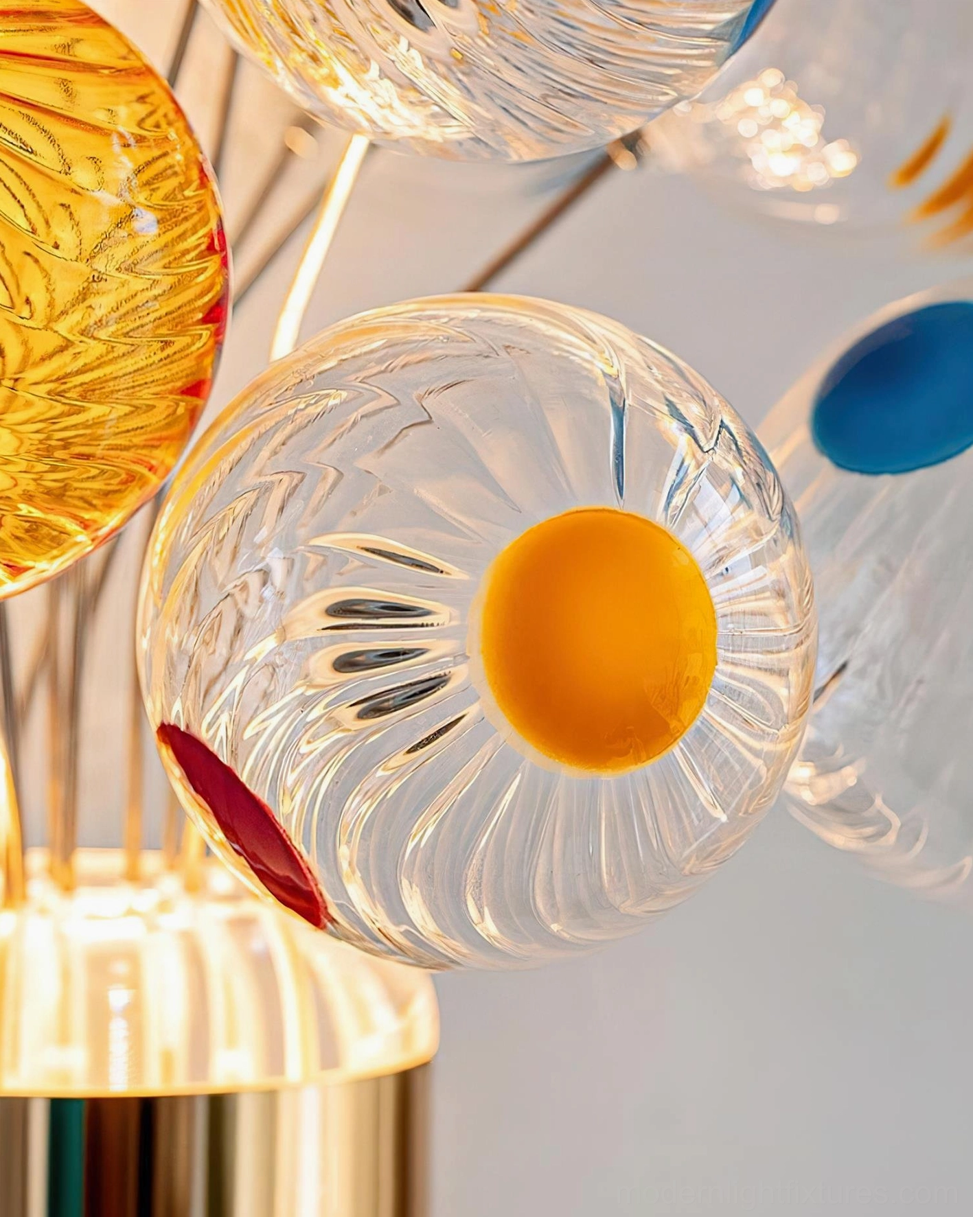 Balloon Bouquet Wall Sconce interior design accent showing whimsical hand-blown glass orbs with elegant gold base fixture