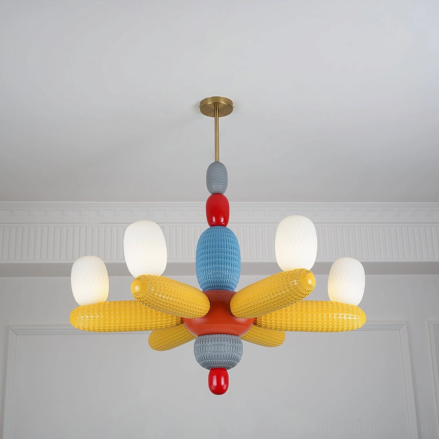 Colorful balloon chandelier with frosted bulb shades and yellow fabric lamp arms in white interior
