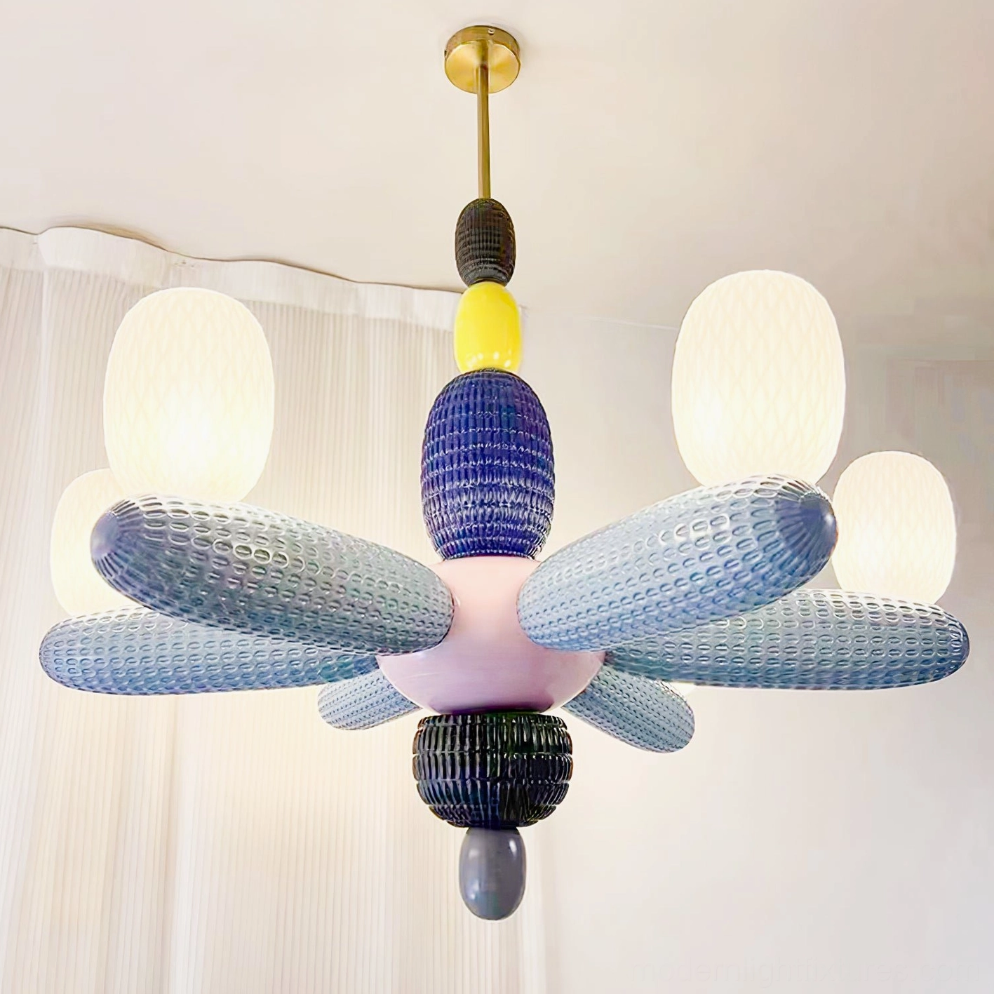 Balloon chandelier close-up showing hand-blown glass texture and glossy surface finish
