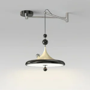 Black and beige adjustable swing arm pendant lamp with polished metal details, front angle showing decorative bead accents and tapered neck