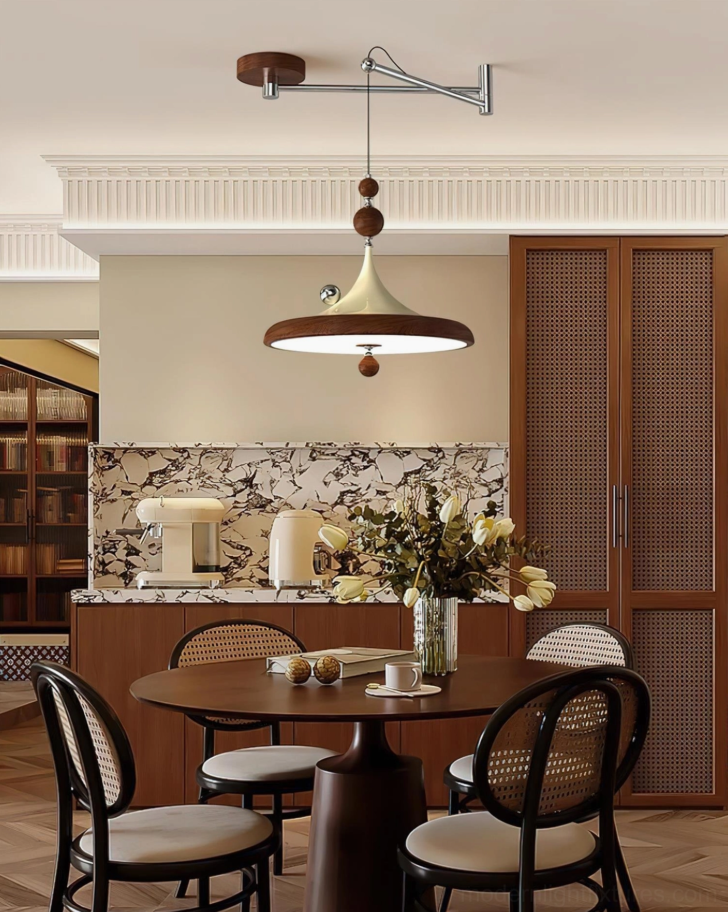 Warm wood tone Ballora adjustable pendant lamp in retro kitchen-dining area, wide room view showing vintage interior coordination