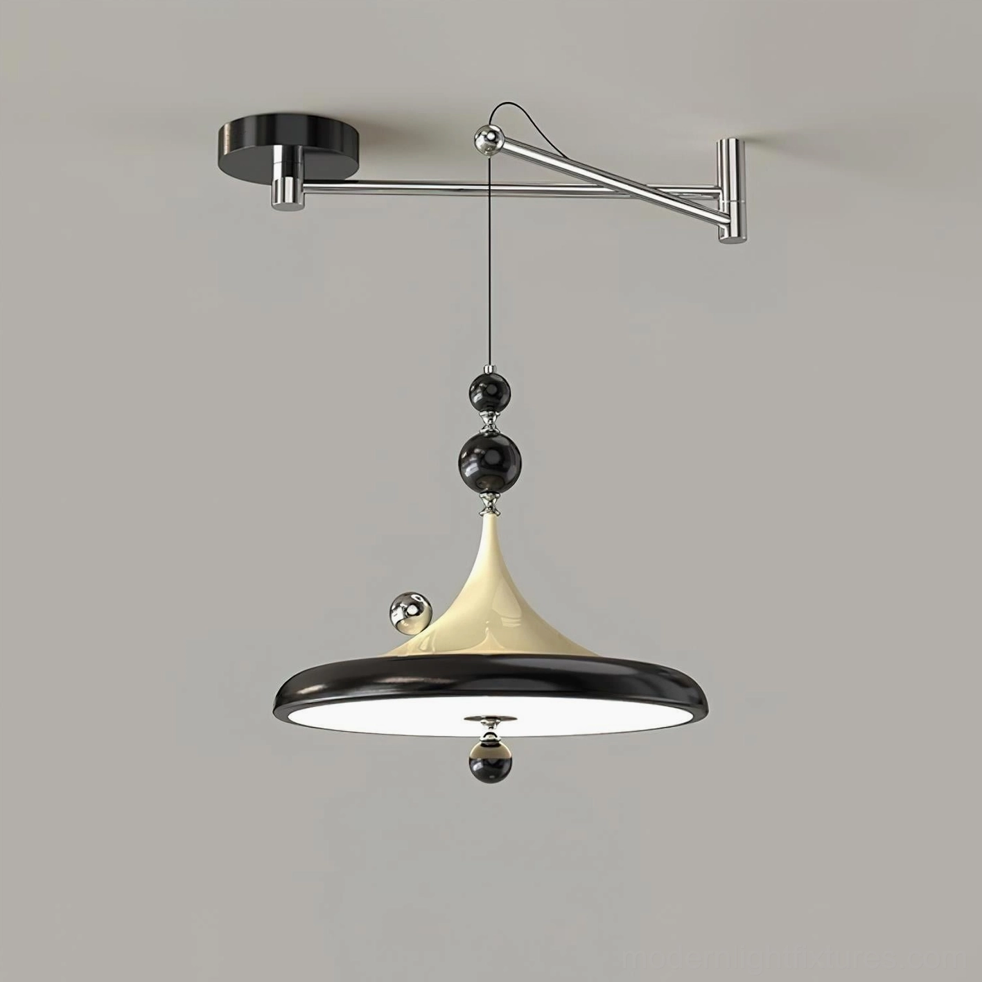 Black and beige Ballora adjustable pendant lamp close-up detail, showing flared shade, metal hardware, and sculptural design elements