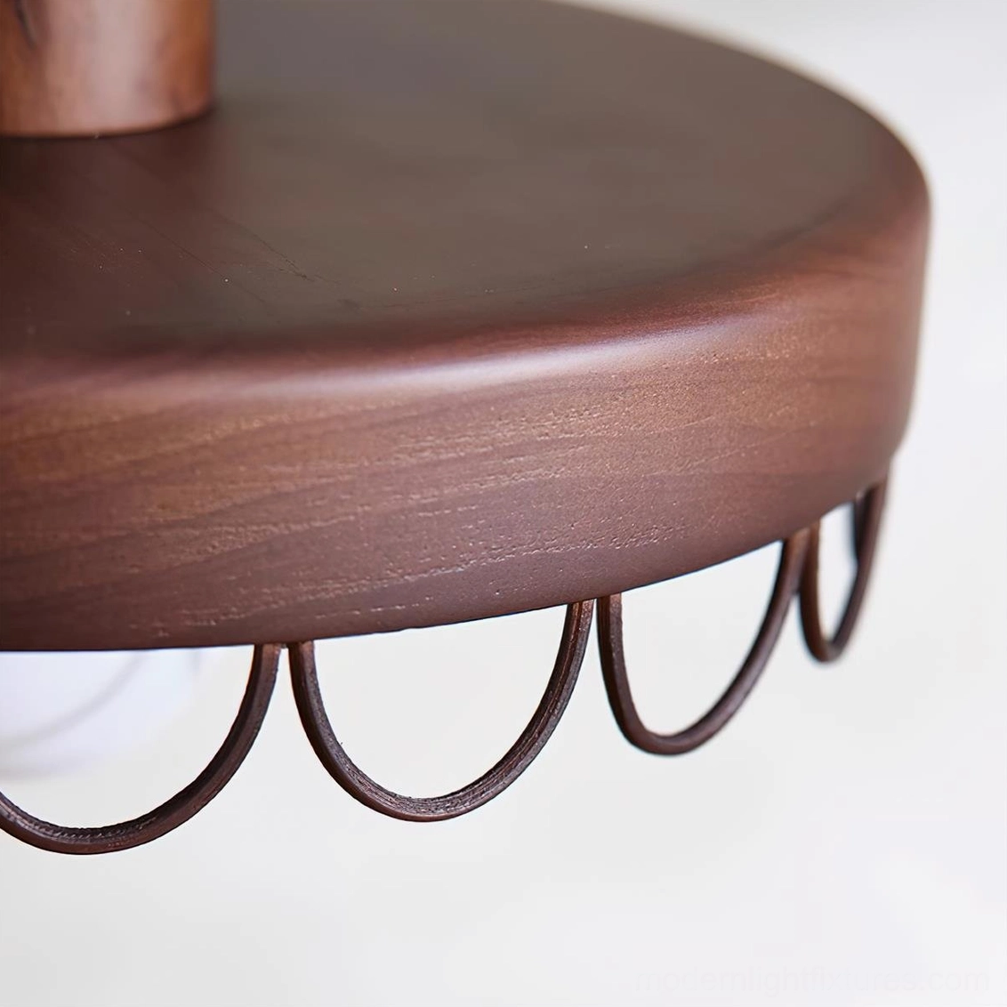 Balton modern pendant light detail shot highlighting wood grain texture and craftsmanship of scalloped metal design