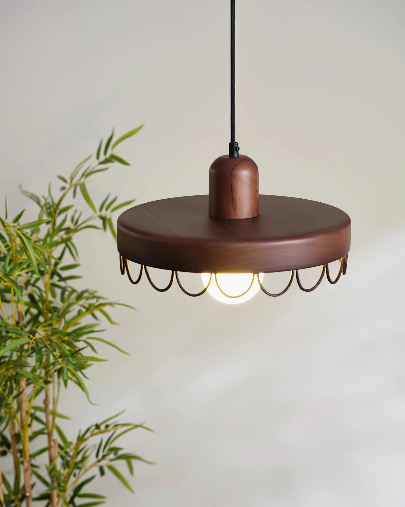 Overhead view of Balton modern pendant fixture showing circular wooden shade and scalloped metal guard design detail
