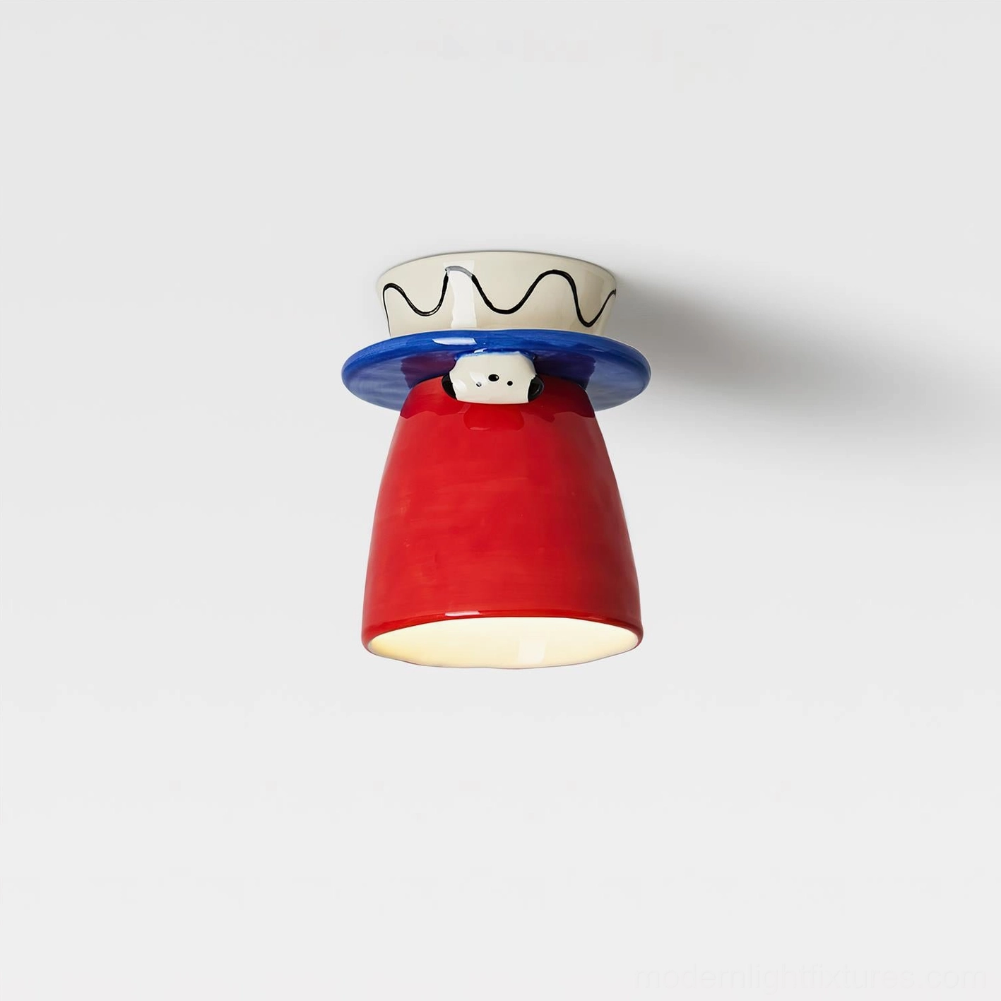 Bambino handcrafted ceramic ceiling light red variant - sculptural puppy detail with vibrant blue collar accent