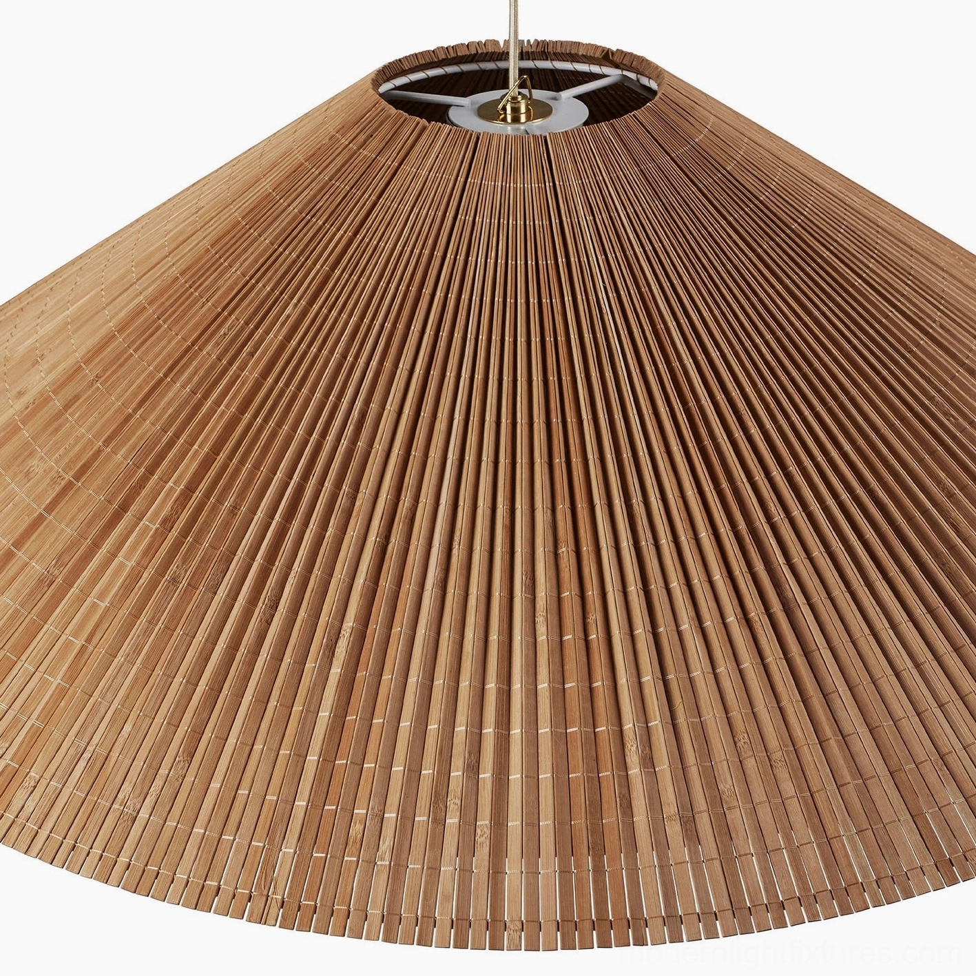 Natural bamboo and warm brass pendant light fixture detail showing material quality and craftsmanship