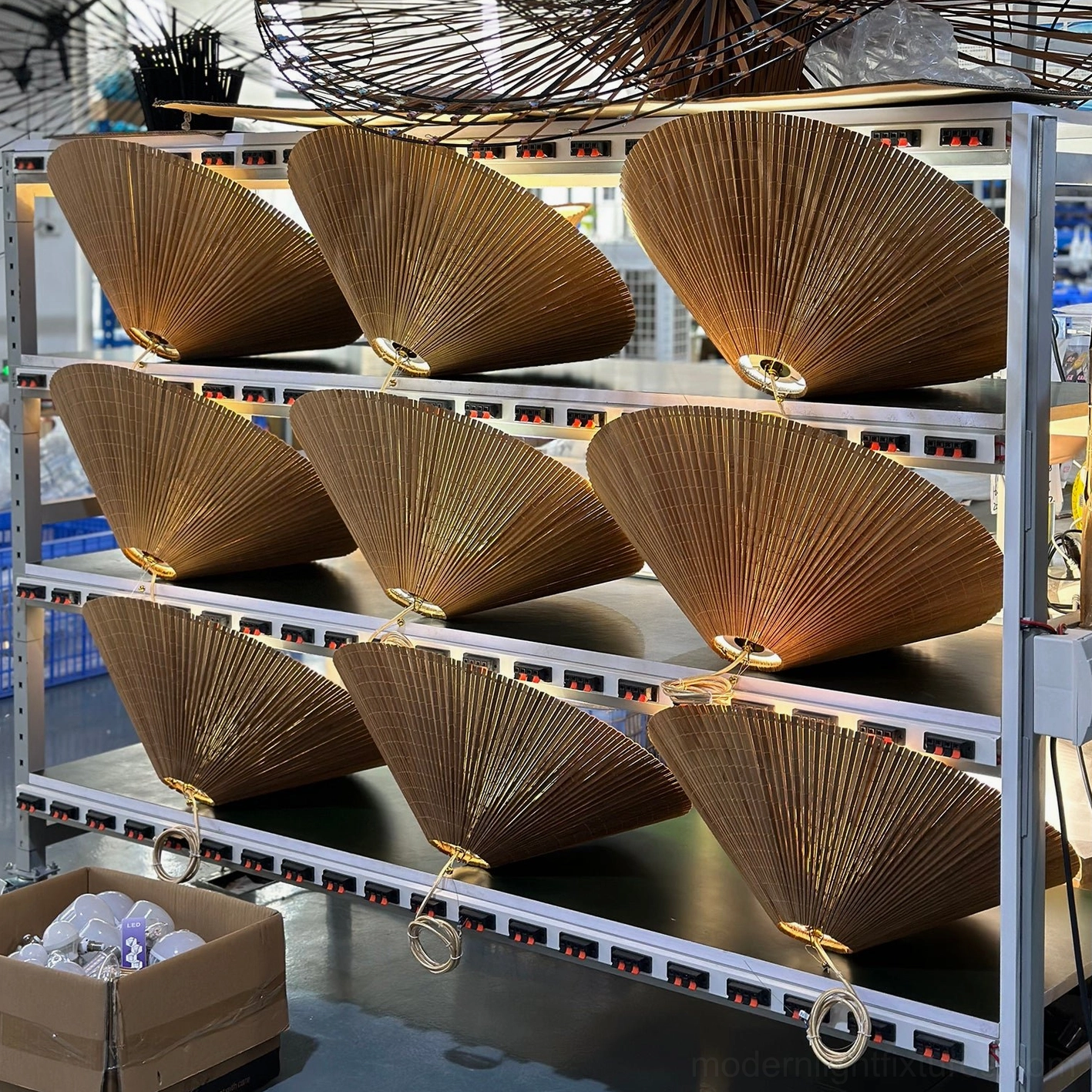 Conical pleated bamboo pendant light shade form and silhouette in neutral interior background