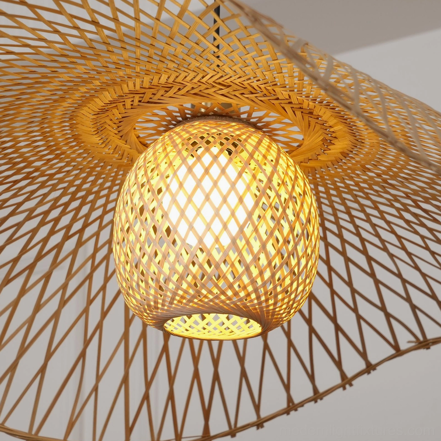 Natural bamboo lotus leaf hanging pendant light with adjustable cord length, wabi-sabi design in minimalist home setting