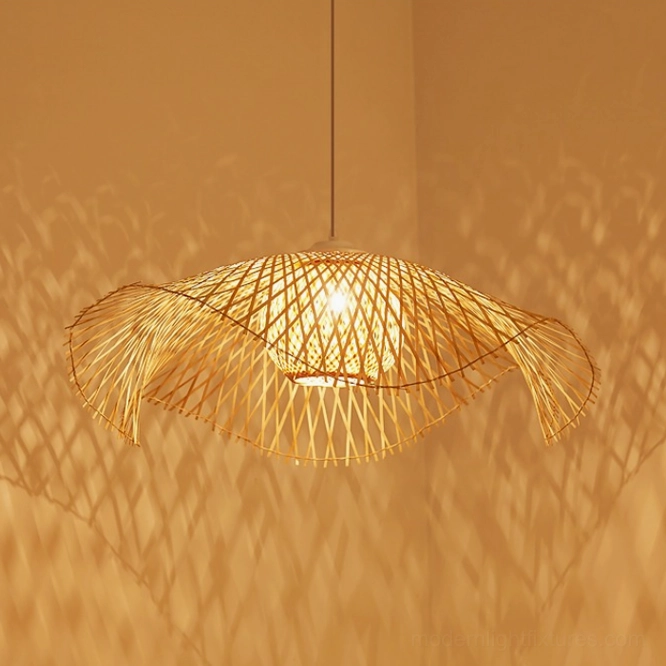 Bamboo lotus leaf pendant light in bohemian eclectic interior with artisanal craftsmanship and global design aesthetic