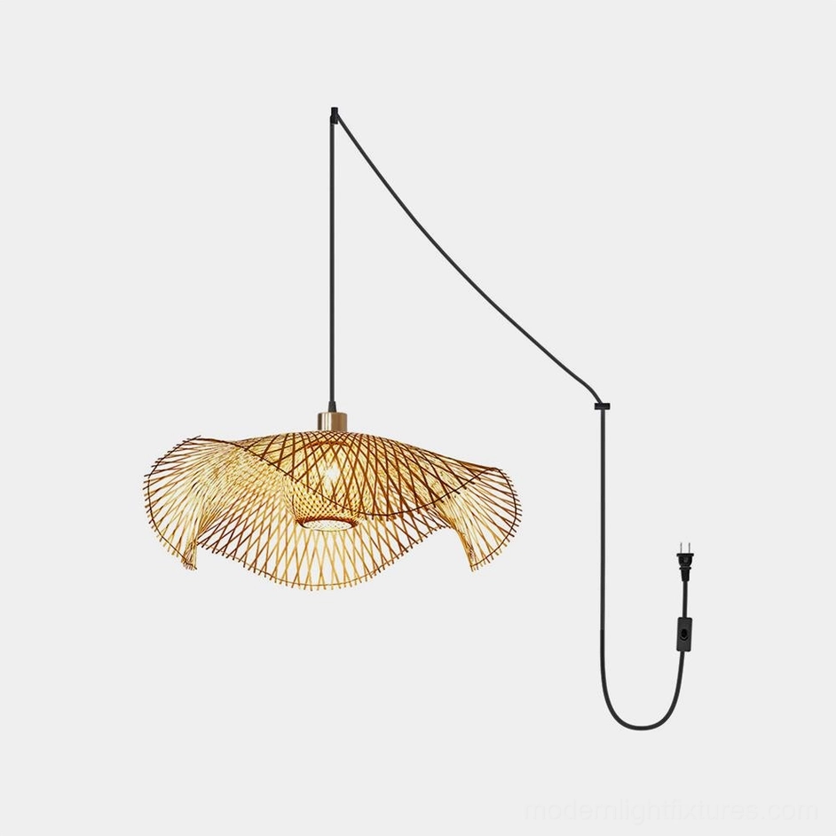 Natural bamboo lotus leaf lamp in industrial chic space softening concrete and metal with warm organic texture