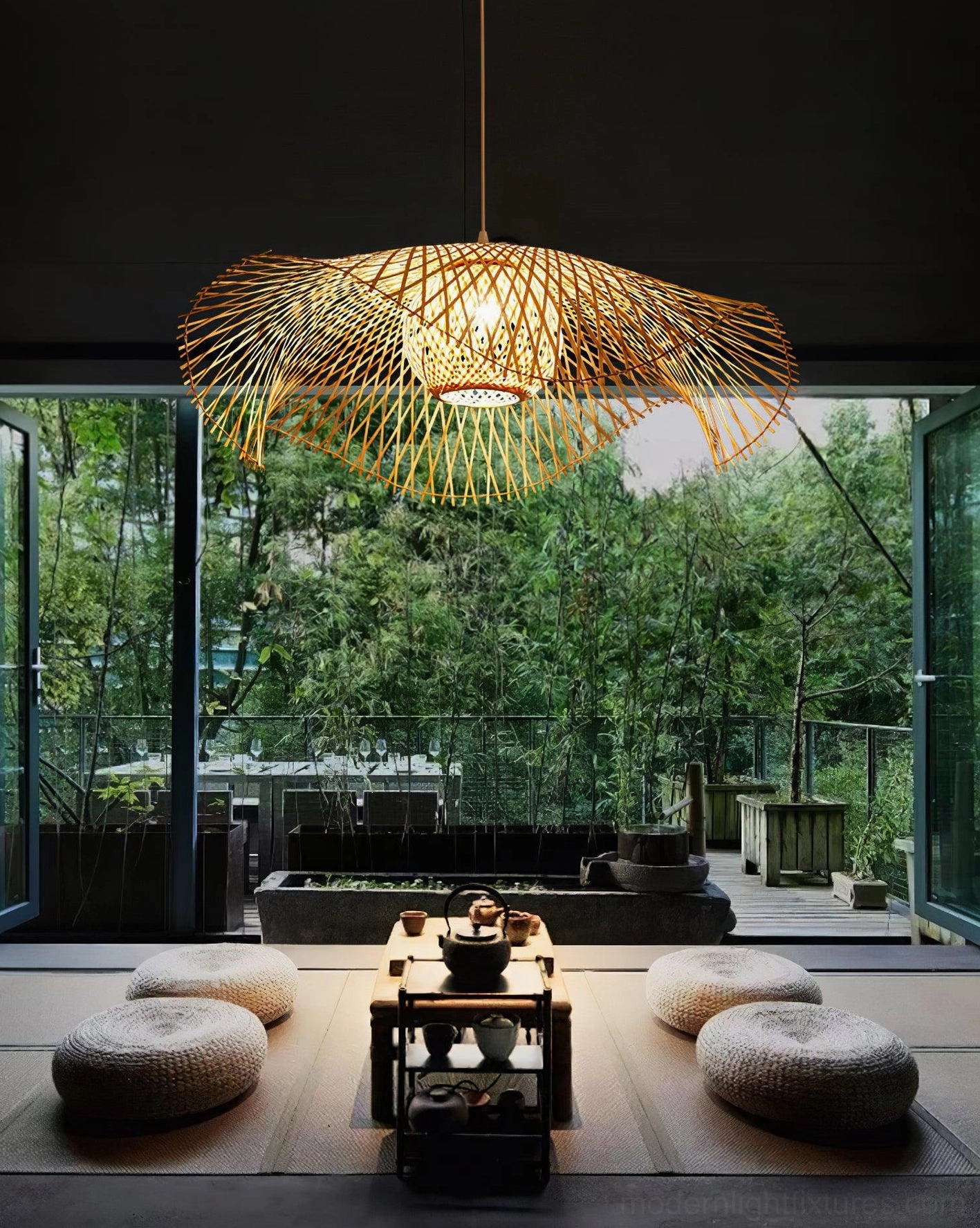 Handcrafted bamboo lotus leaf pendant light demonstrating warm light diffusion through woven shade in residential setting
