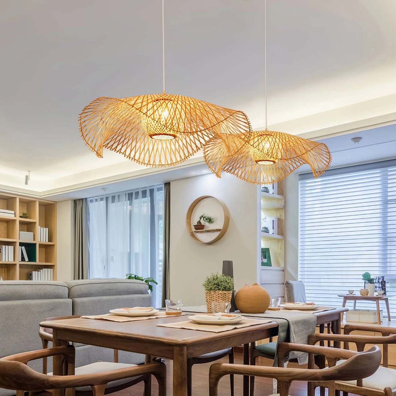 Bamboo lotus leaf pendant lamp suspended above dining table with warm lighting creating intimate ambiance for dining space