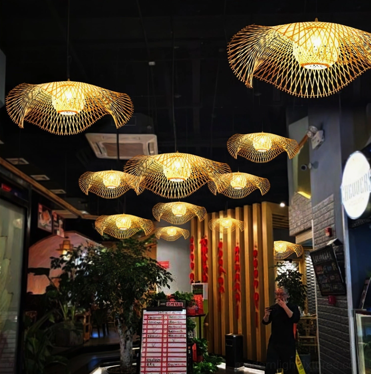 Multiple bamboo lotus leaf pendant lamps in various sizes displayed to show diameter and scale comparison of options