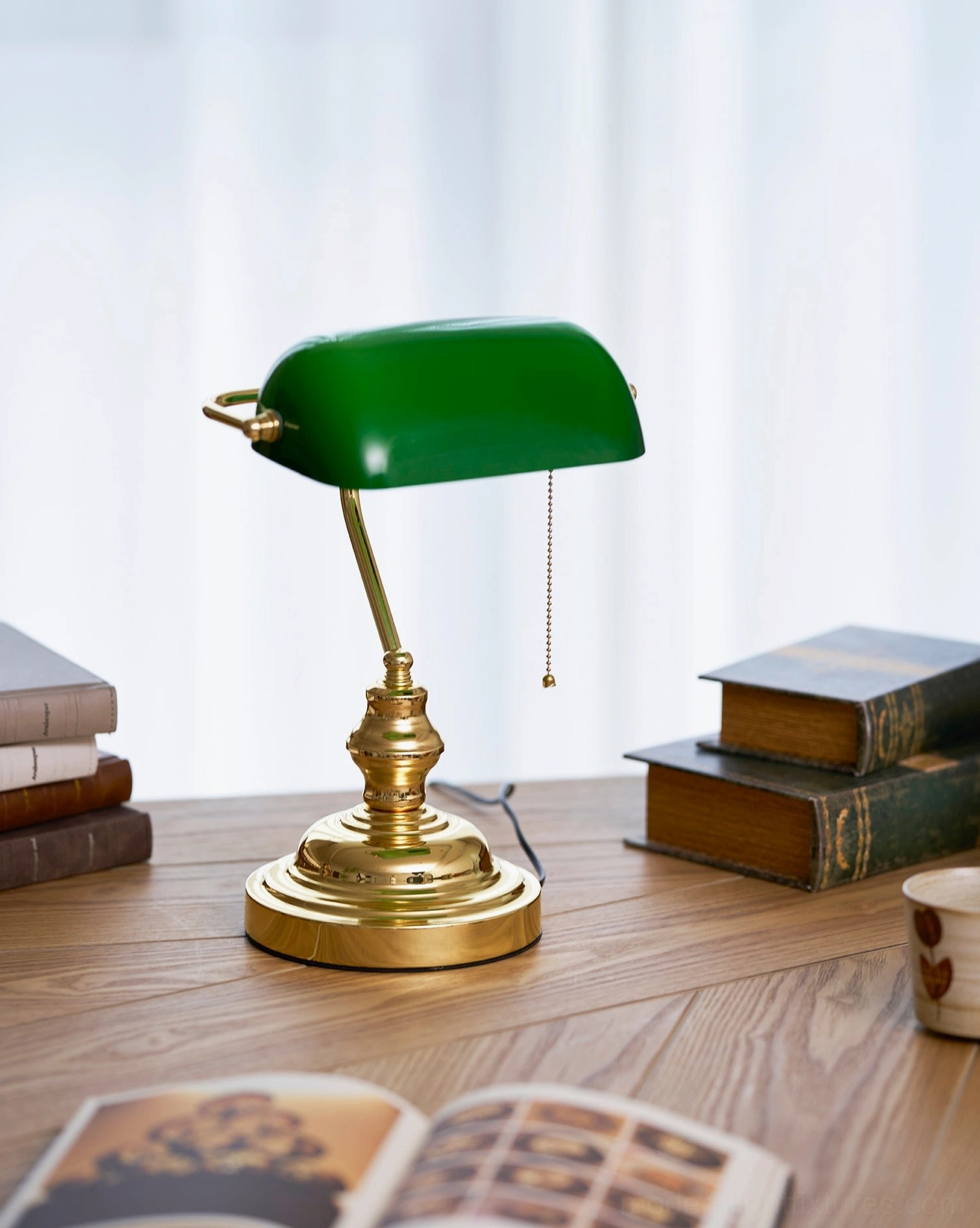Vintage banker table lamp front view polished gold metal base glass shade