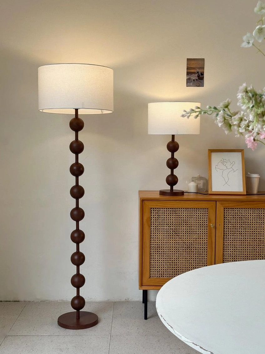 Natural wood barbell floor lamp entryway statement piece