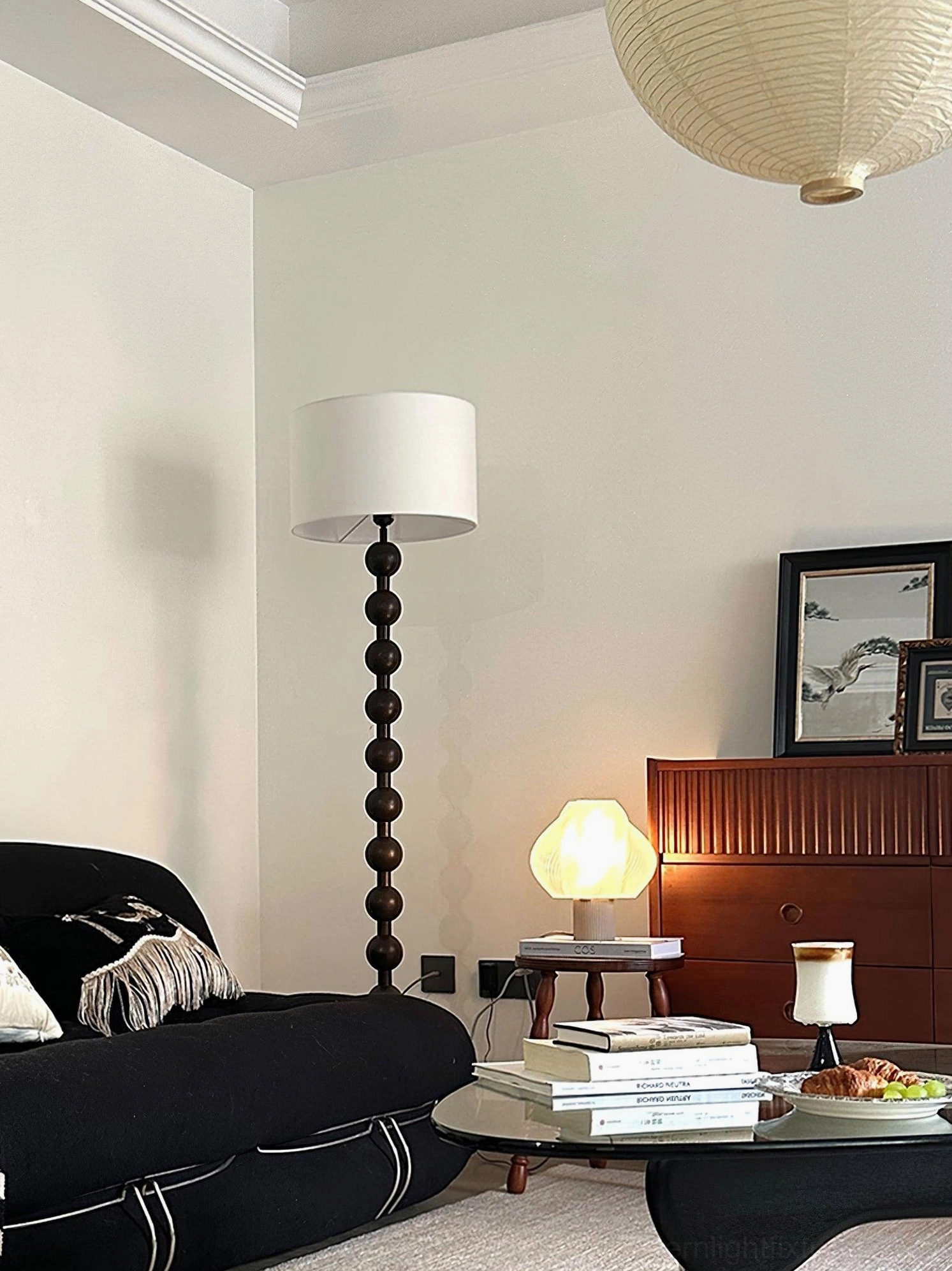 Natural wood barbell floor lamp lifestyle photography home setting
