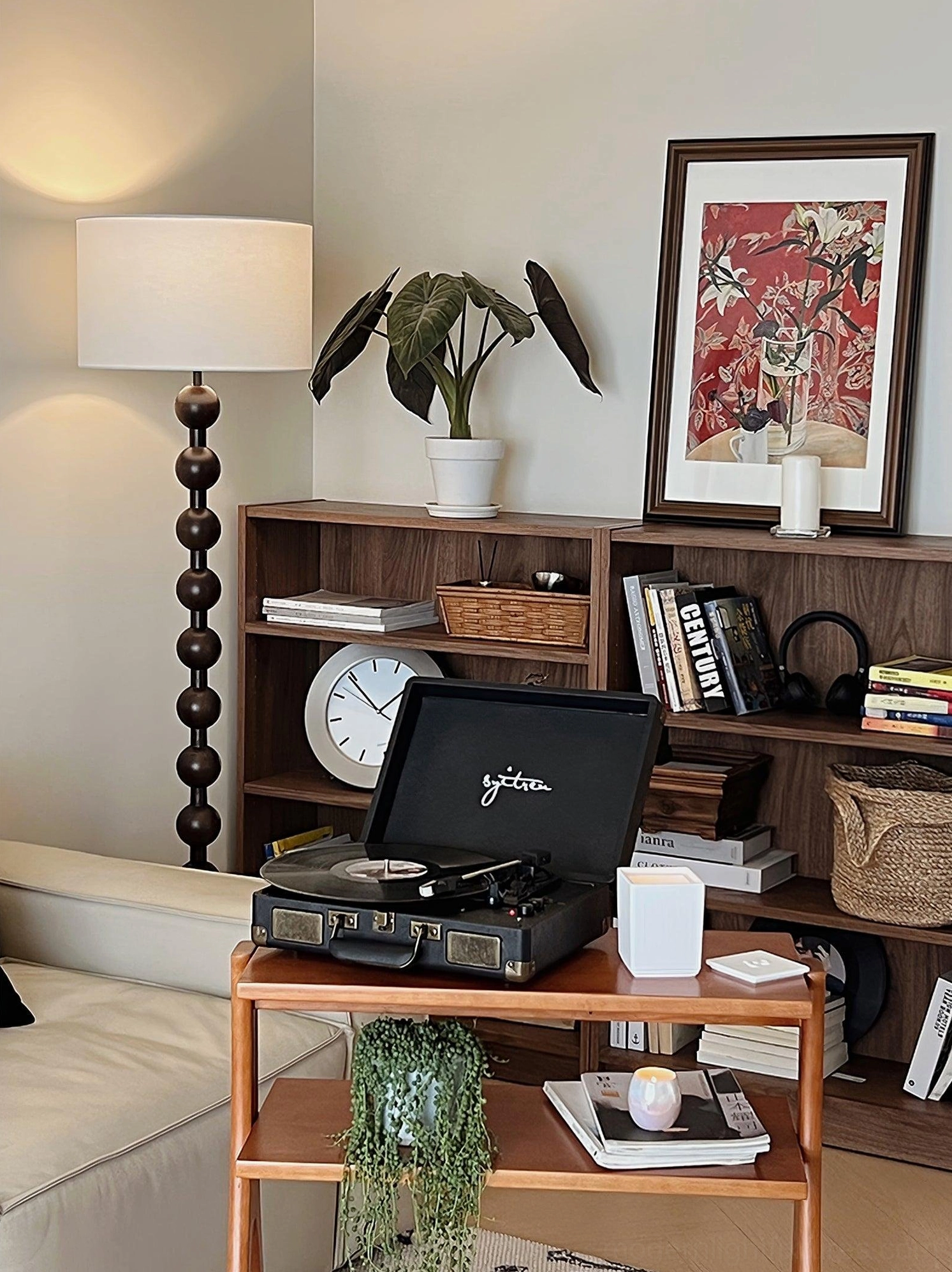 Walnut barbell floor lamp in eclectic maximalist home office space