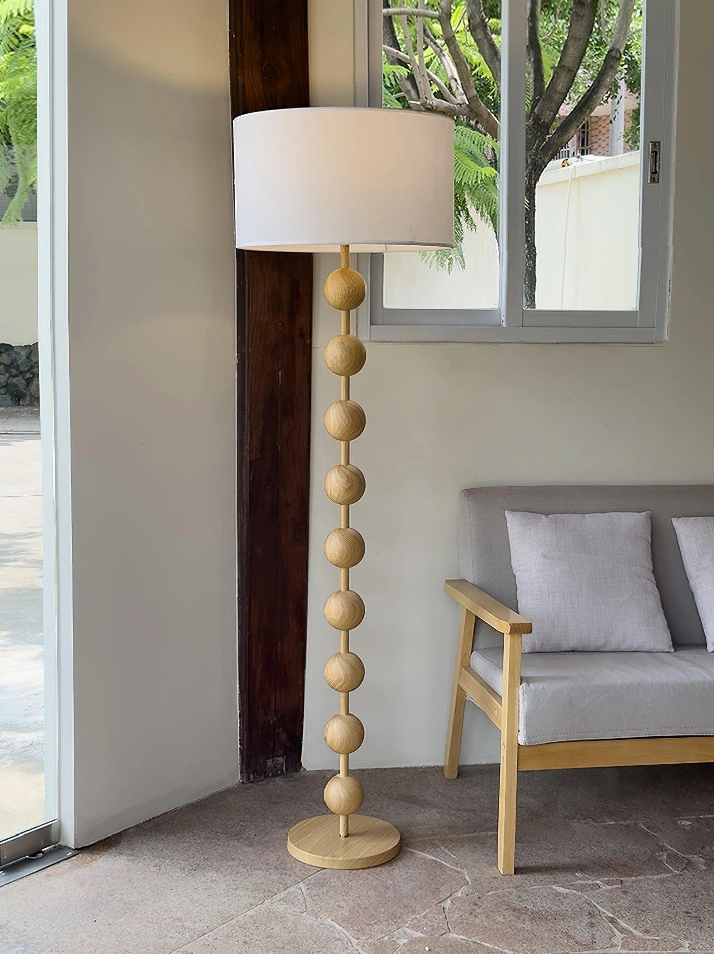 Barbell floor lamp with natural wood finish in Scandinavian interior design