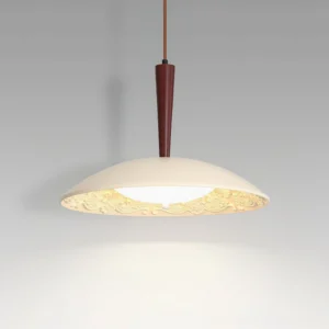 Baroque Halo resin pendant light three-quarter front view with dark wood accent, embossed floral interior pattern visible