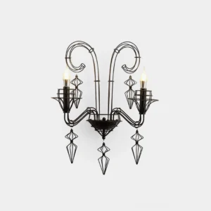 Black baroque wall sconce with dual candle-style arms in wrought iron, frontal studio view showing sculptural metal scrollwork design
