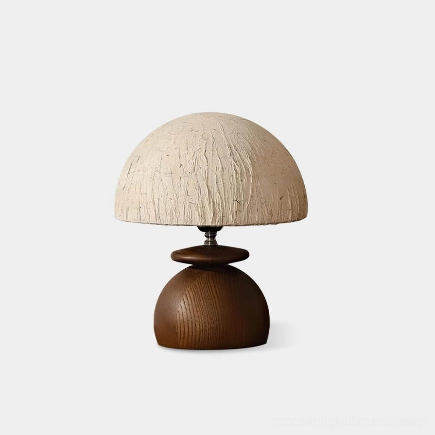 Basira mushroom table lamp with textured cream paper shade and dark walnut wood stacked base, front view on white background