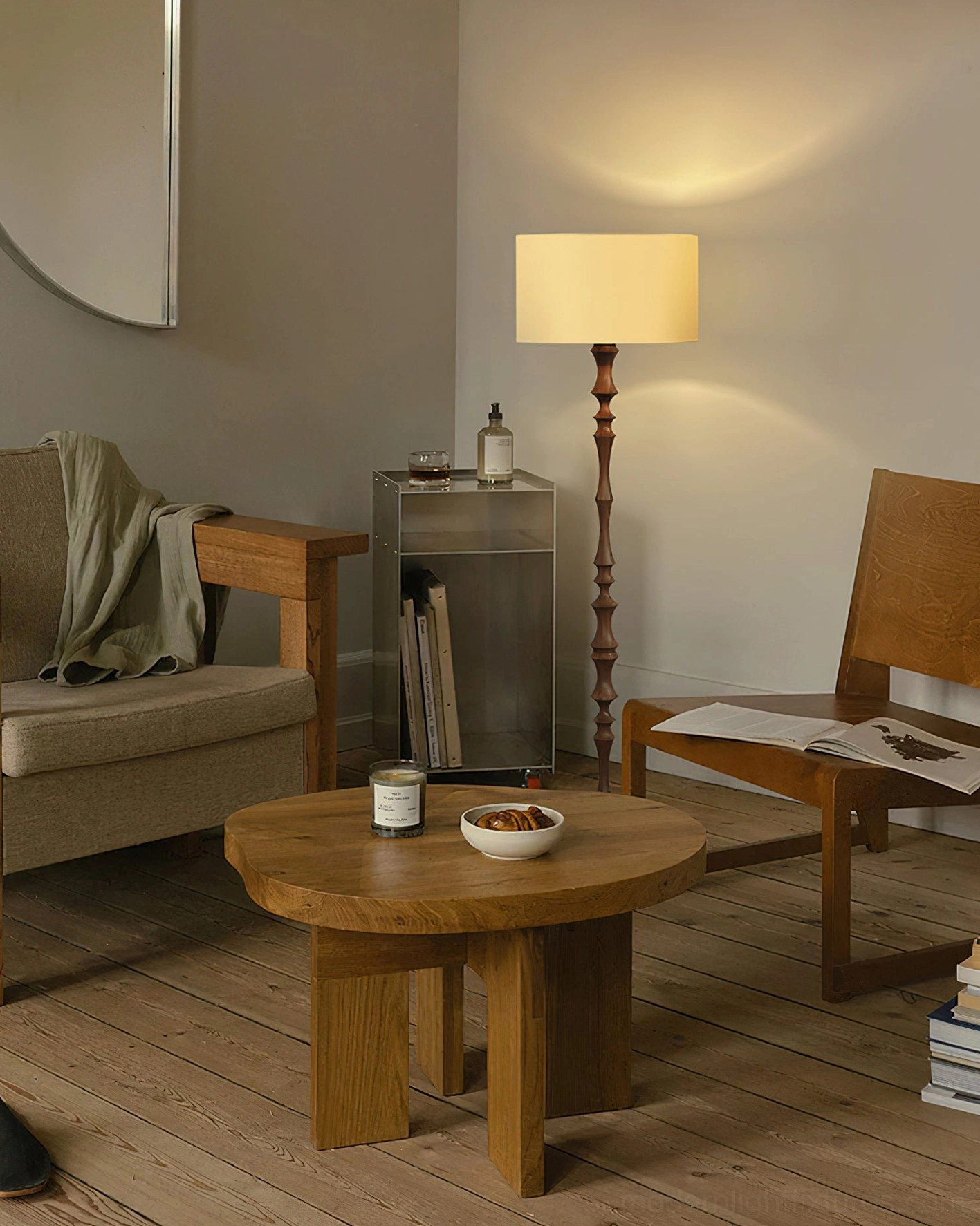 Walnut Bastino sculptural floor lamp with beige fabric shade in rustic warm interior