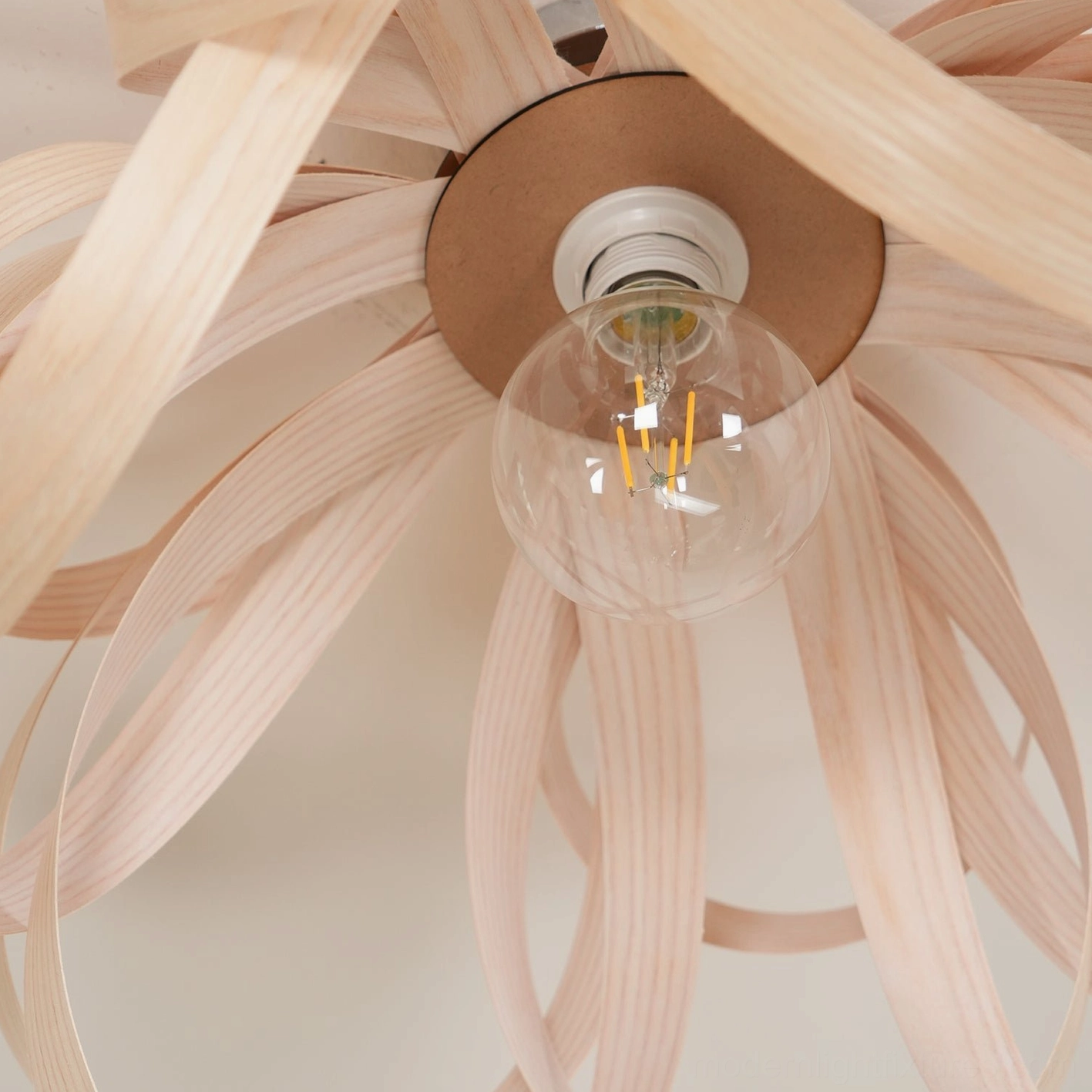Damp-rated wood petal ceiling light suitable for bathroom installation