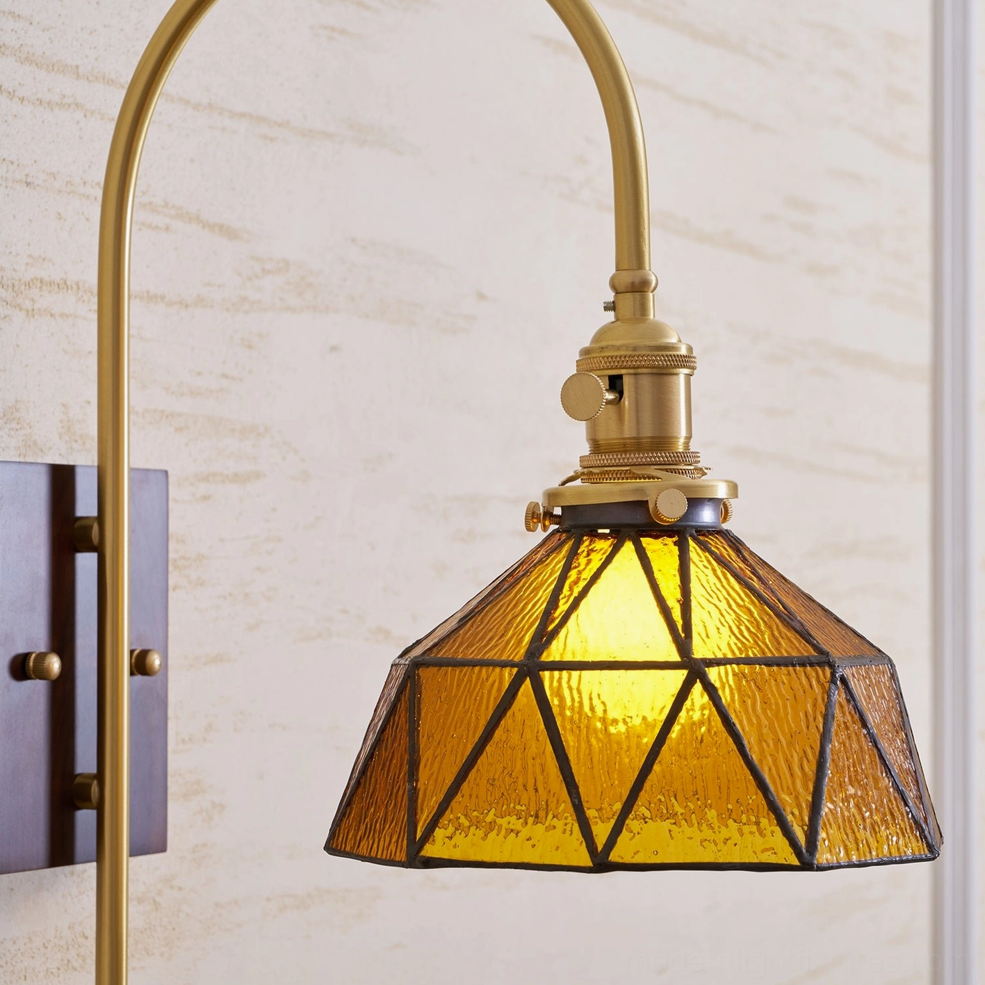 Bathroom vanity wall sconce in damp-rated configuration for moisture-resistant performance