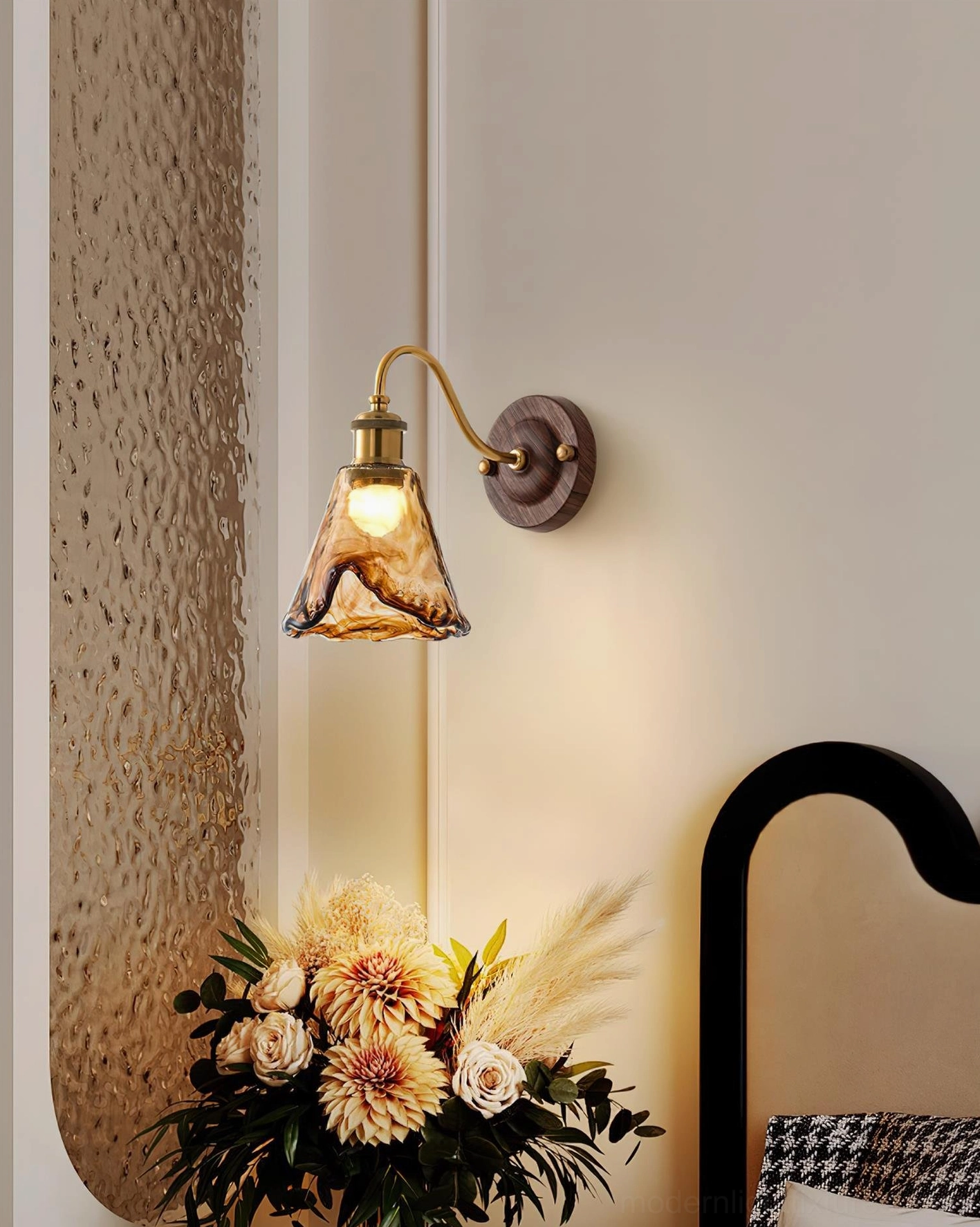 Contemporary wall sconce pair in master bathroom vanity area providing professional task and ambient lighting