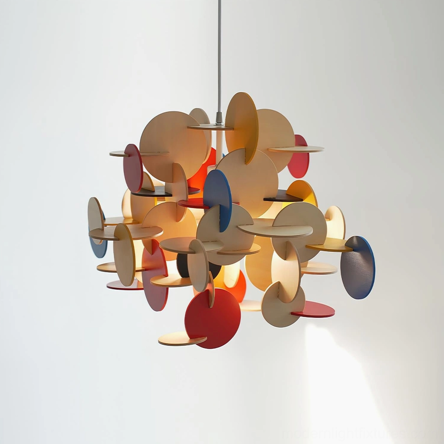 Bau geometric pendant light low angle close-up with warm side lighting on wooden disc panels
