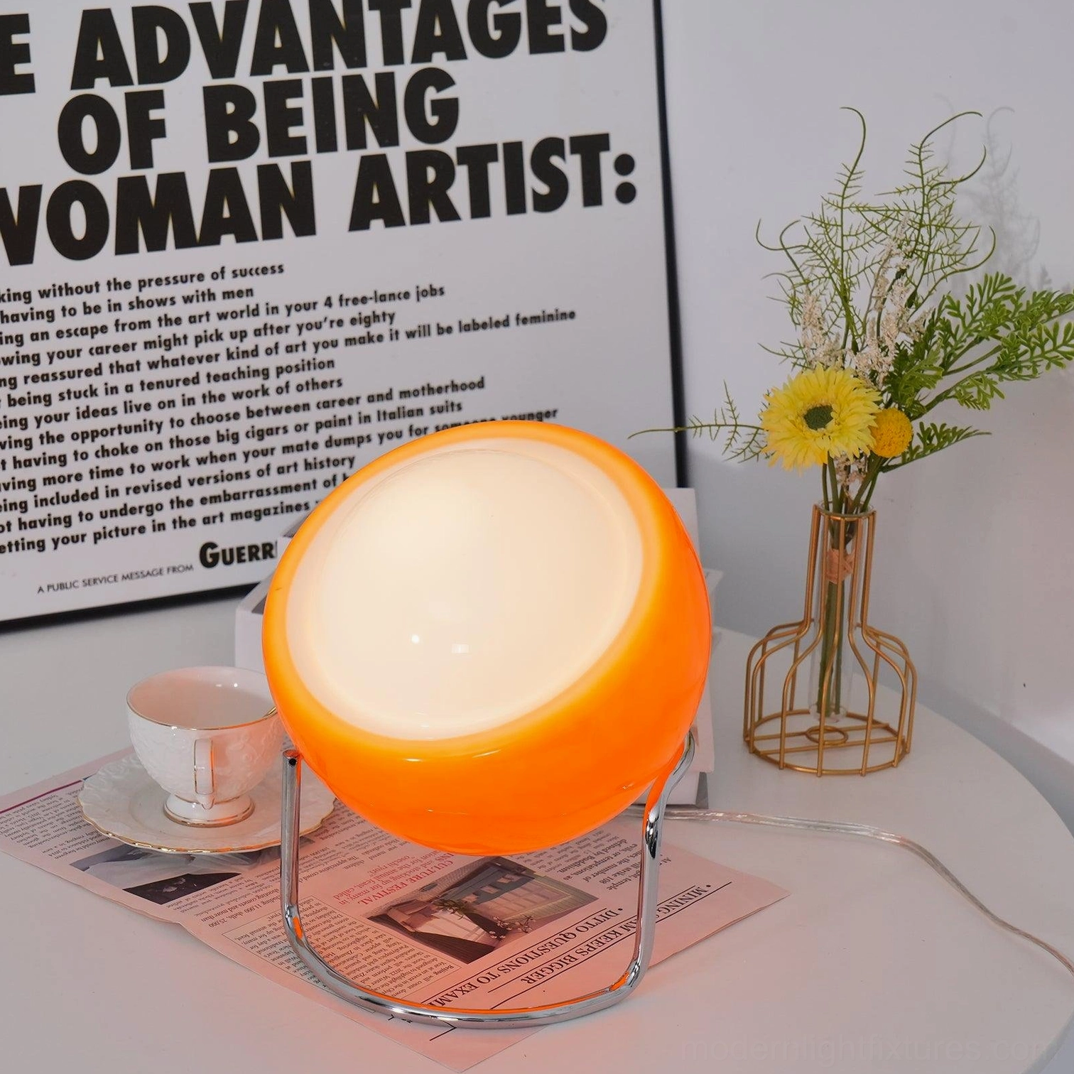 Bauhaus table lamp with warm illuminated dome shade on chrome tripod base, ambient lighting display