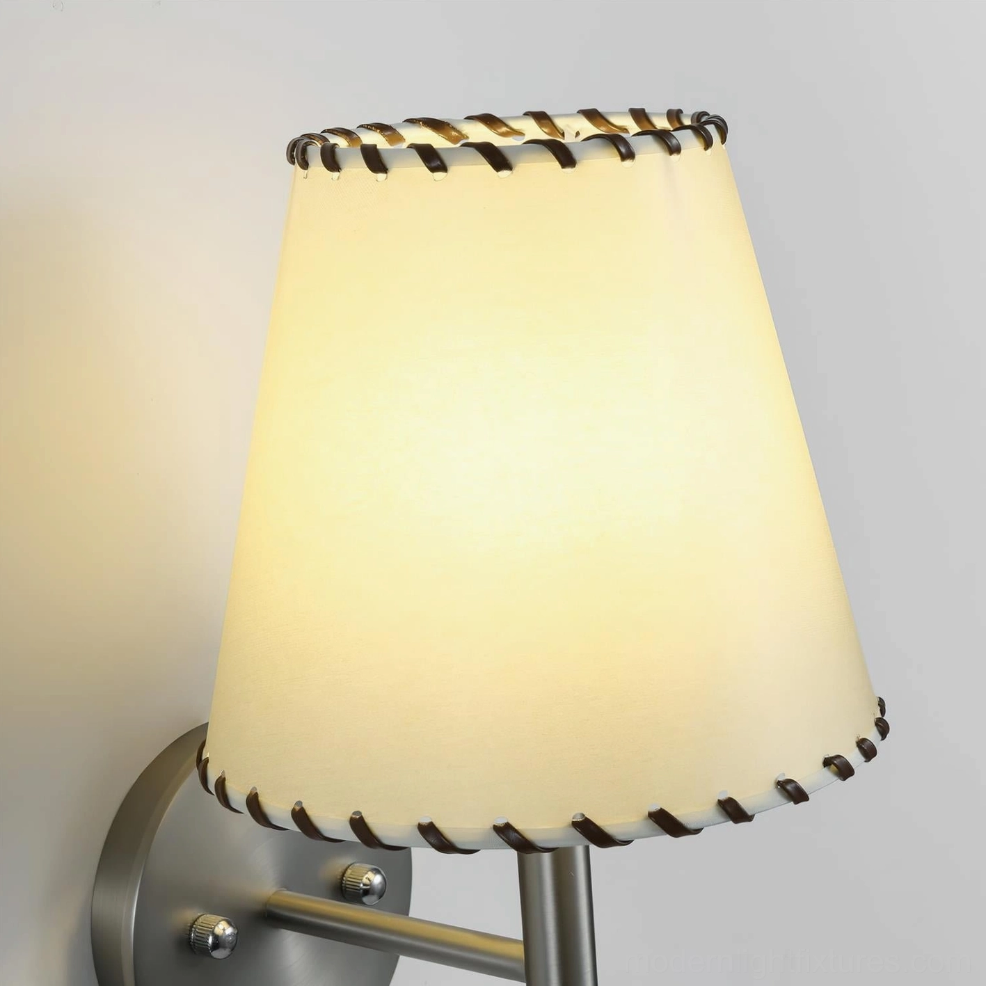 BC2 industrial wall sconce with nickel and wood color finish options displayed on studio background