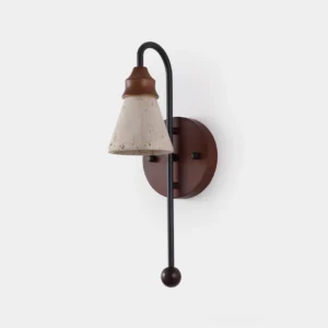 Beacon modern wall sconce with black metal arm and natural travertine cone shade front view