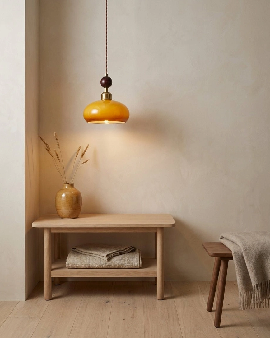 Bead pendant light minimalist entryway with wooden bench dried floral accents neutral warm tones