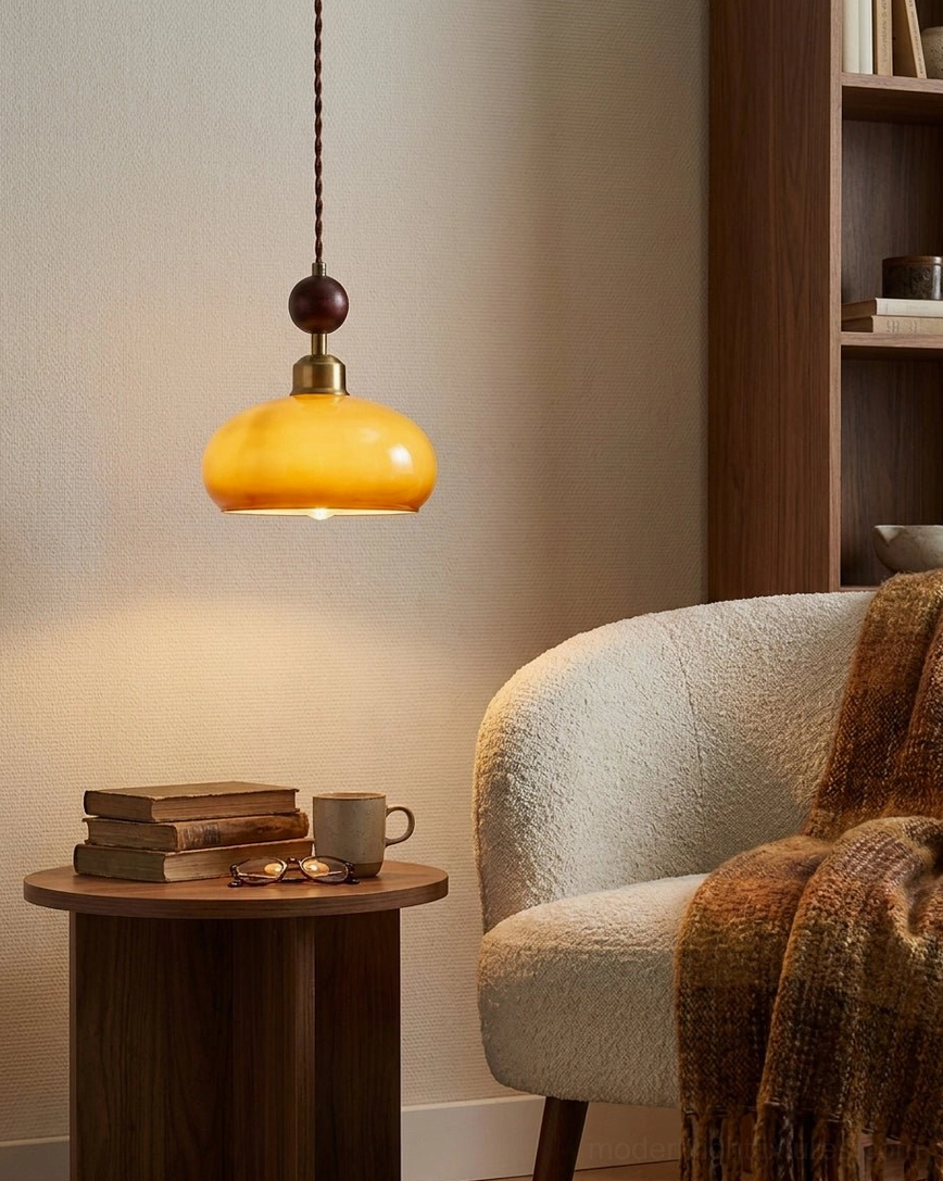 Bead pendant light amber glass shade brass frame wooden bead accent modern fixture detail
