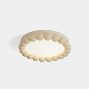Beaded LED ceiling light with cream finish showing sculptural round bead texture on white background