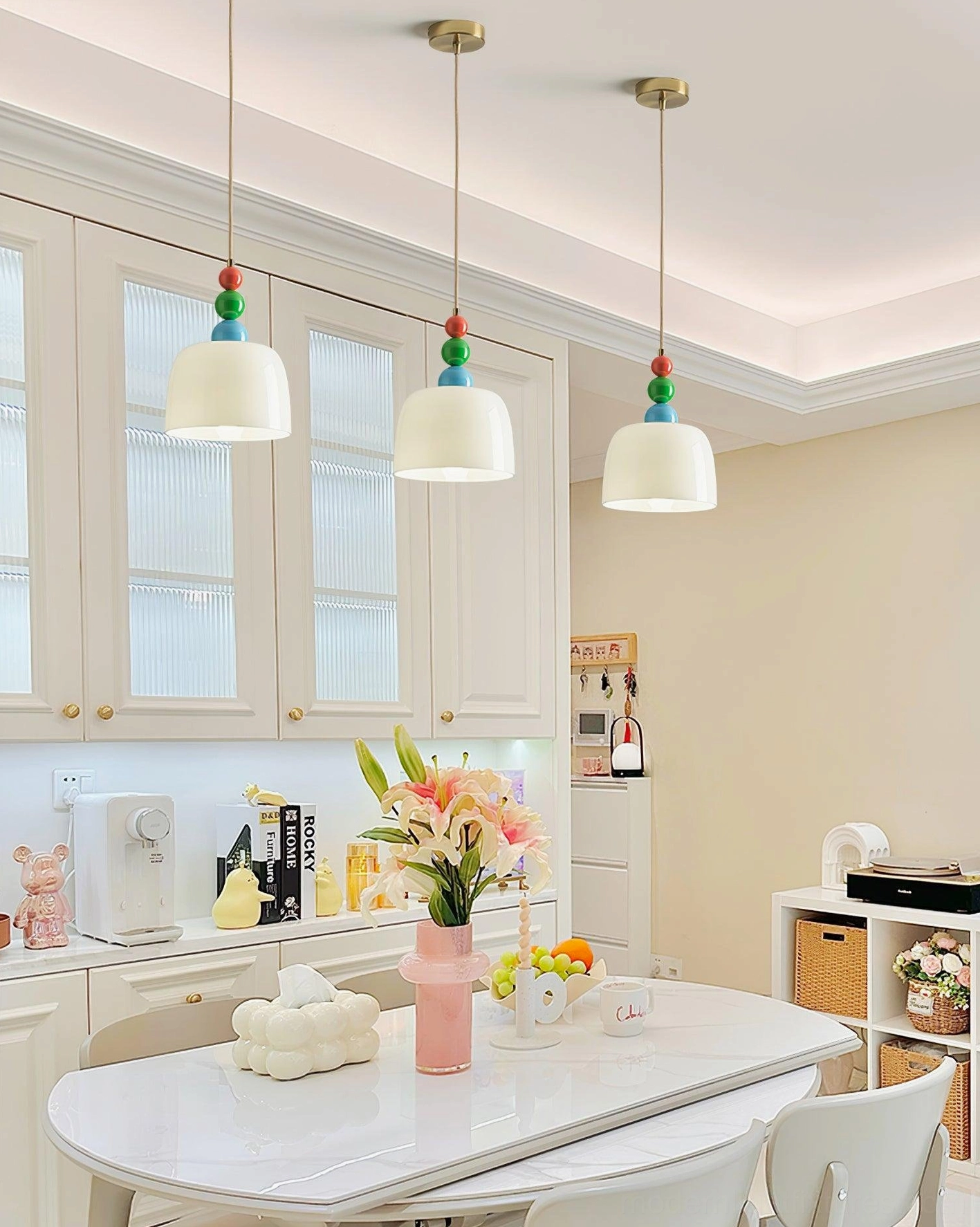 Modern beaded hanging lamp with frosted glass shade in Scandinavian style interior