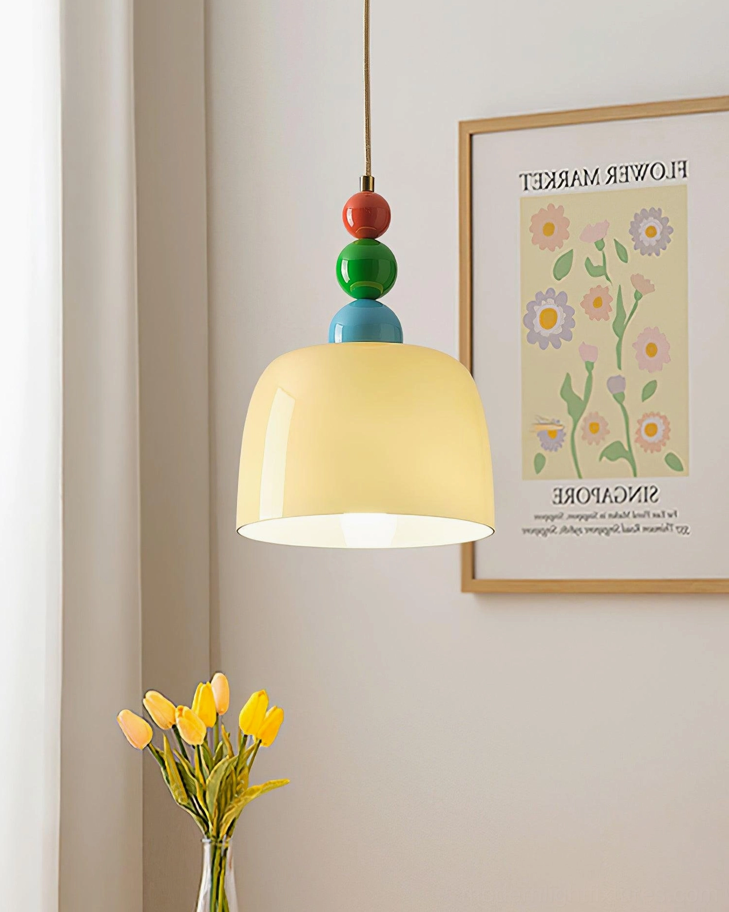 Modern colorful beaded pendant light in transitional interior design setting