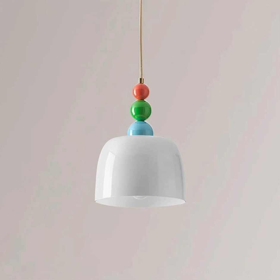 Beaded pendant light with white frosted glass shade in modern minimalist interior