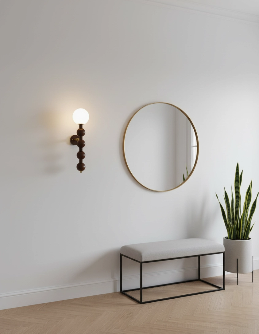 Beaded globe wall lamp in white finish mounted on contemporary minimalist interior wall