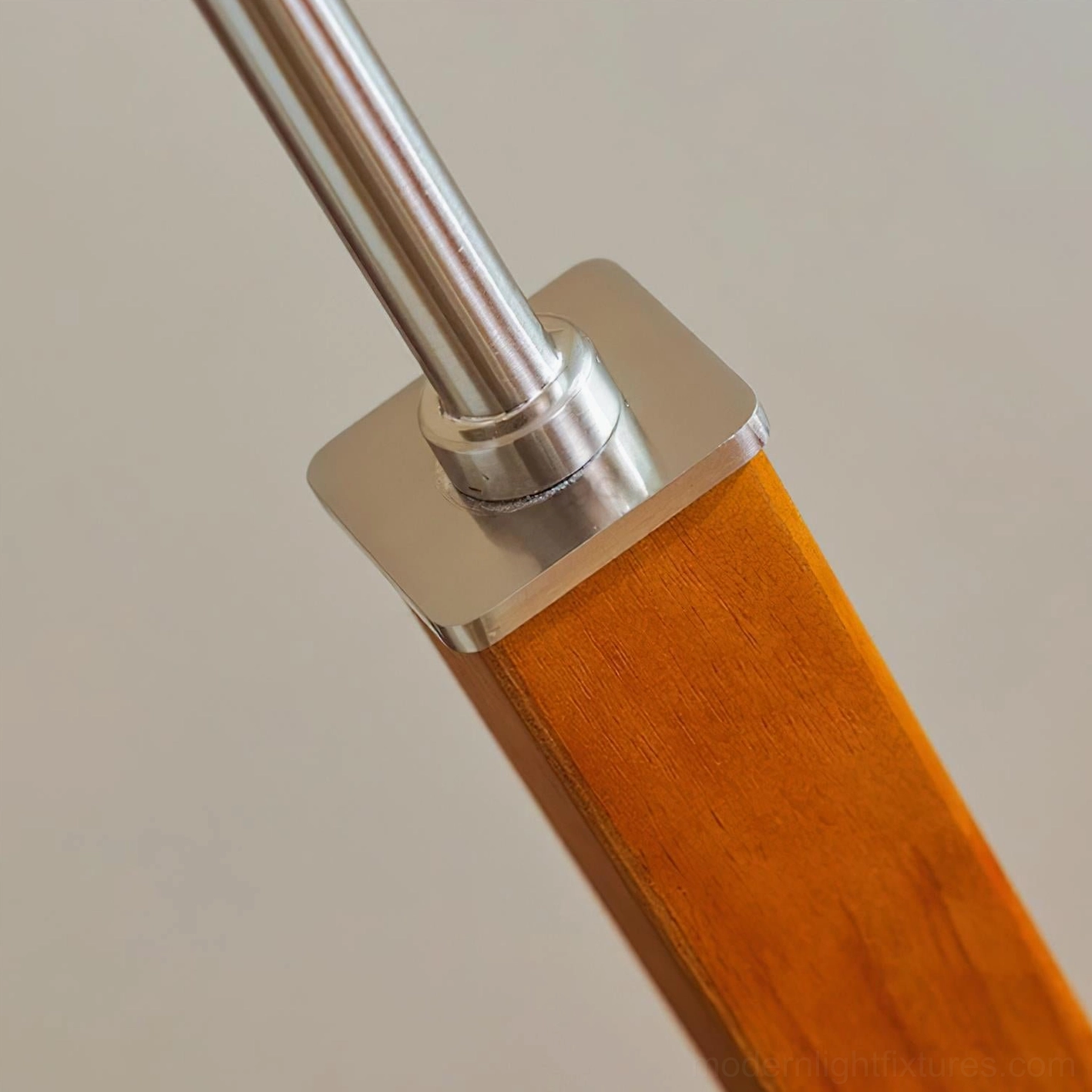 Beamline cantilever floor lamp full view showing proportions and material contrast in bedroom setting