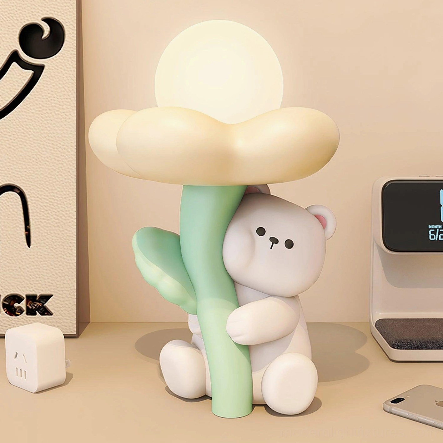 Bear-shaped table lamp in bedroom setting with warm ambient lighting, nightlight effect on bedside table with wall art and wireless charger