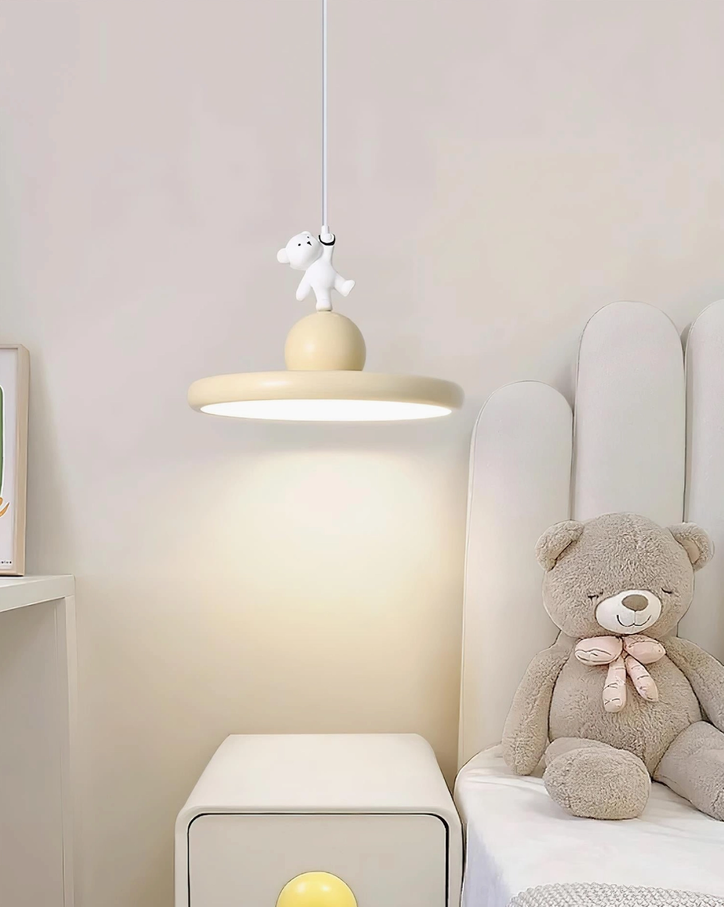 Modern bear pendant light in bedroom setting, cute hanging lamp providing soft bedside illumination in cream decor style