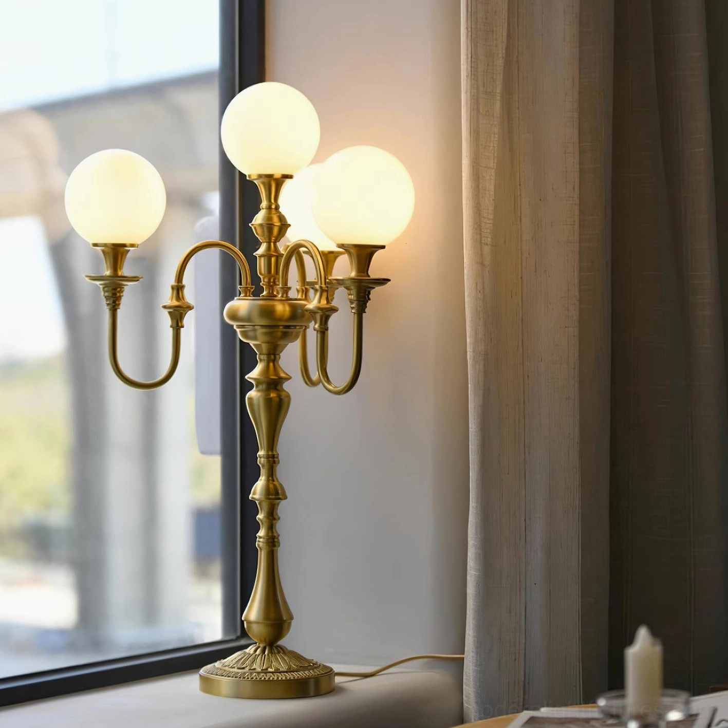 Beatty 4-head brass candlestick table lamp featuring frosted glass shades and premium brass construction