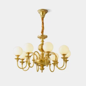 Beatty brass multi-head chandelier with frosted white glass shades, front low-angle view showcasing gold brass frame and spherical globe design